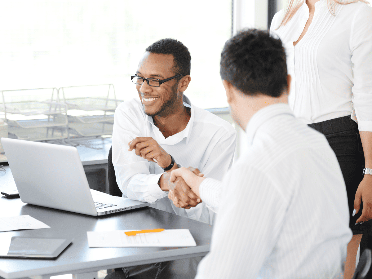 Team reviewing technology plans in a meeting