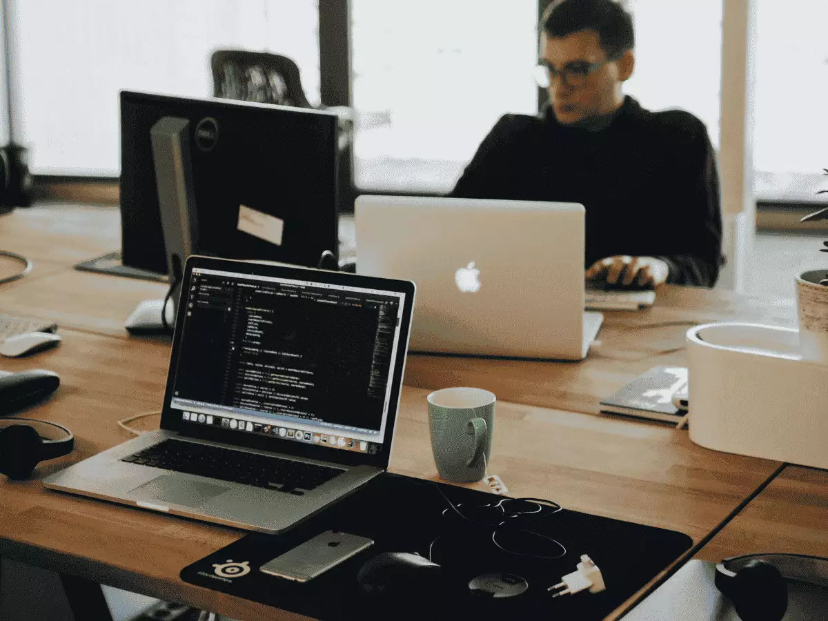 Engineers monitoring cloud infrastructure systems